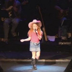 Mini Cowgirl Walks to The Stage To Sings Big Country Song But Wait Till The Music Starts FB_IMG_1763938017587